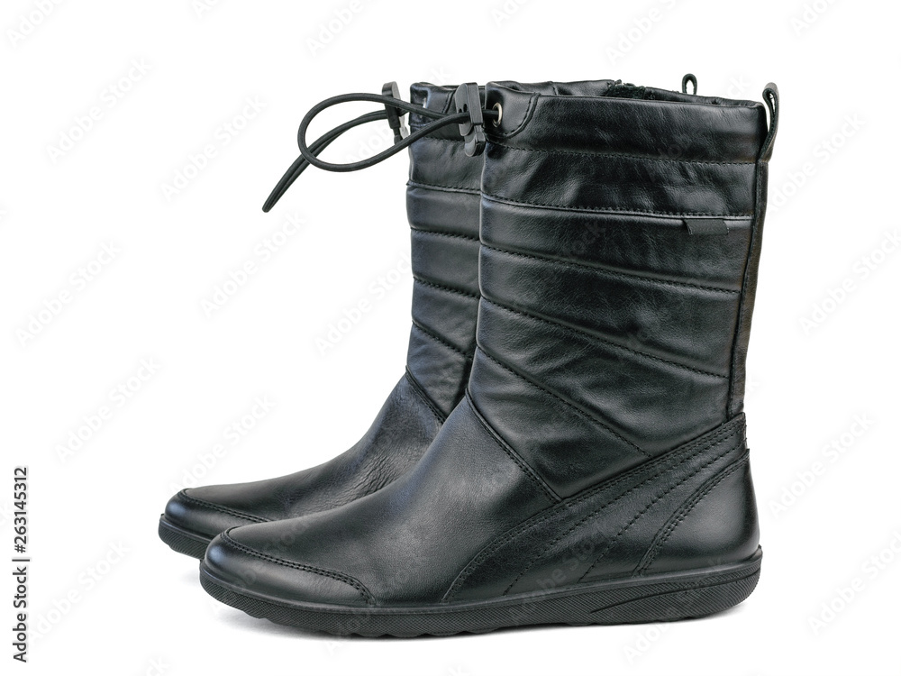 Black leather boots for girl on cold weather isolated on white background. Black leather boots for girl on cold weather isolated on white background.
