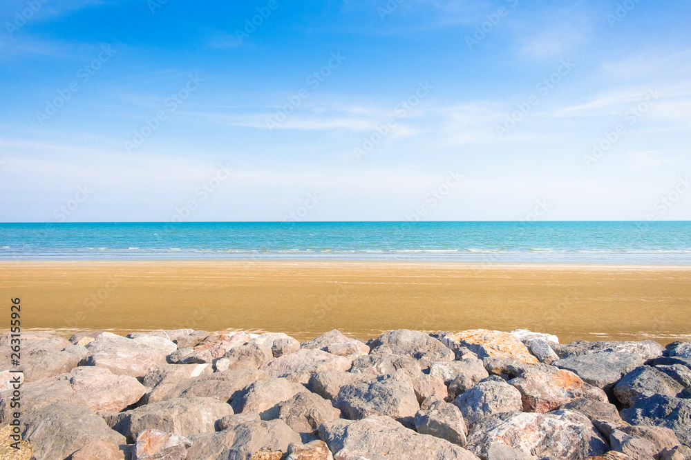Abstract beach background. Yellow sand, blue sky Abstract beach background. Yellow sand, blue sky