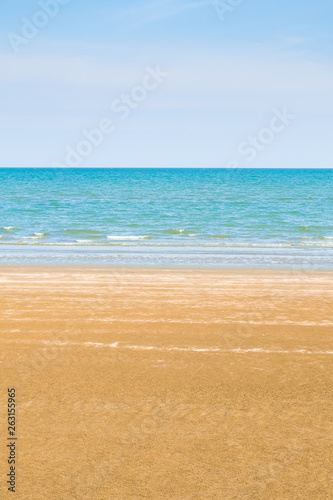 Abstract beach background. Yellow sand, blue sky © sarapon