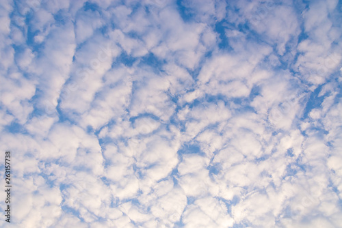 Colorful dramatic sky with many cloud at sunset