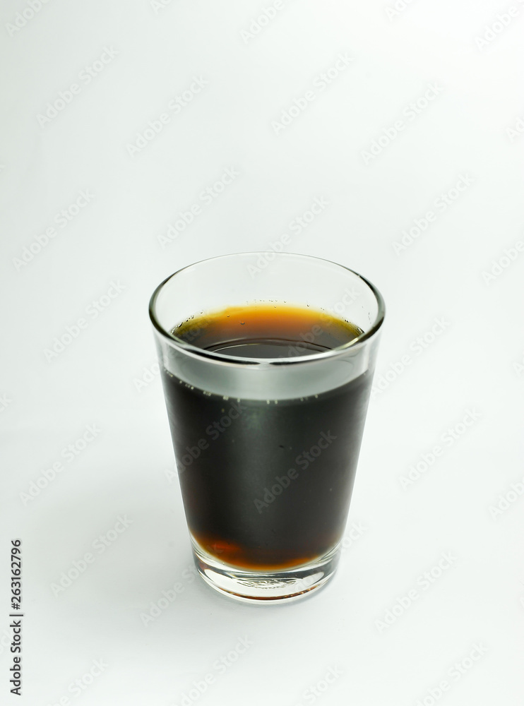 Clear glass with soft drinks Isolated on white background Clear glass with soft drinks Isolated on white background