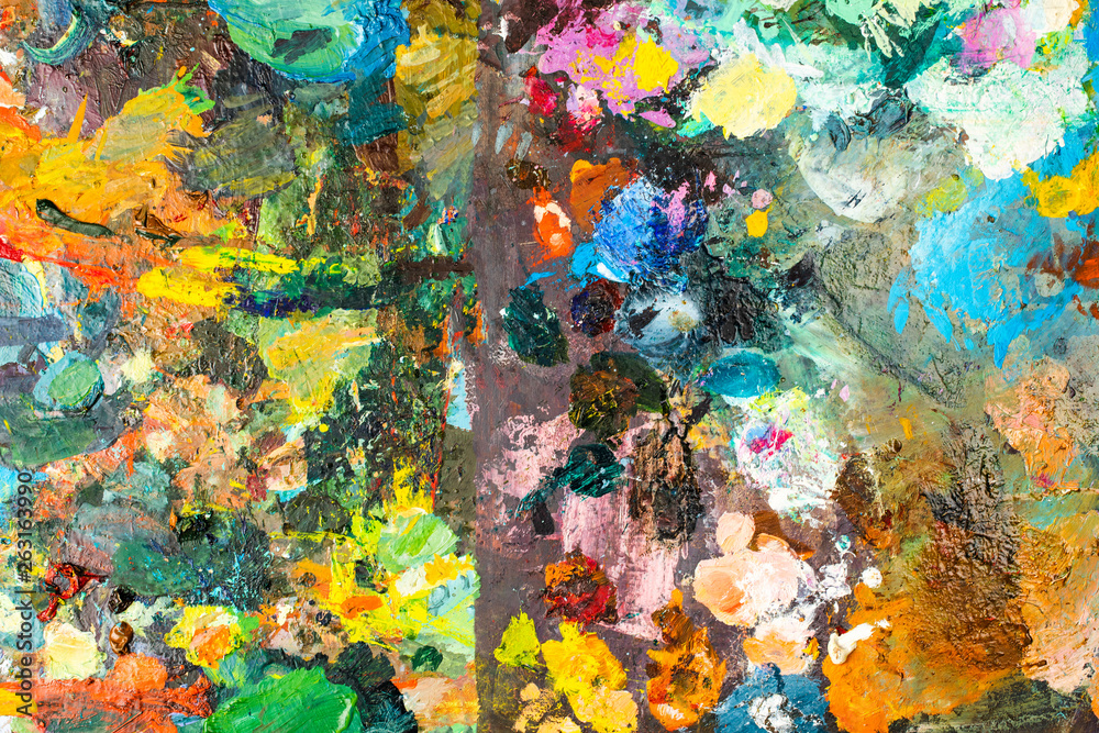 Naklejka premium Background image of bright oil-paint palette closeup.