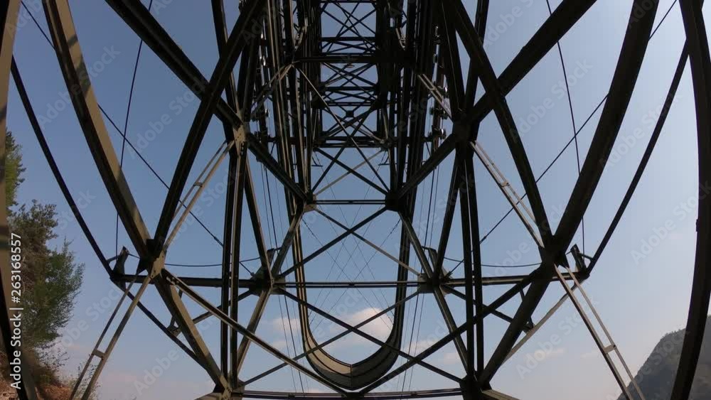 The pylon of the cableway that connects the towns of Albino and Selvino. Green painted pylons to camouflage them in the woods The pylon of the cableway that connects the towns of Albino and Selvino. Green painted pylons to camouflage them in the woods