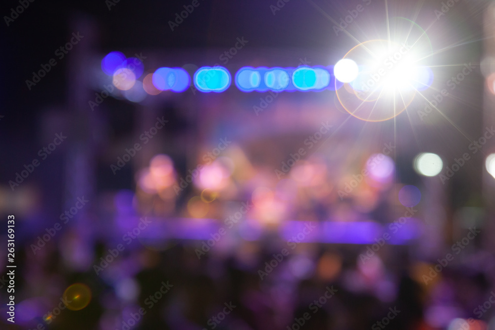 Colorful of light in concert at night.Blurred circle bokeh abstract background.