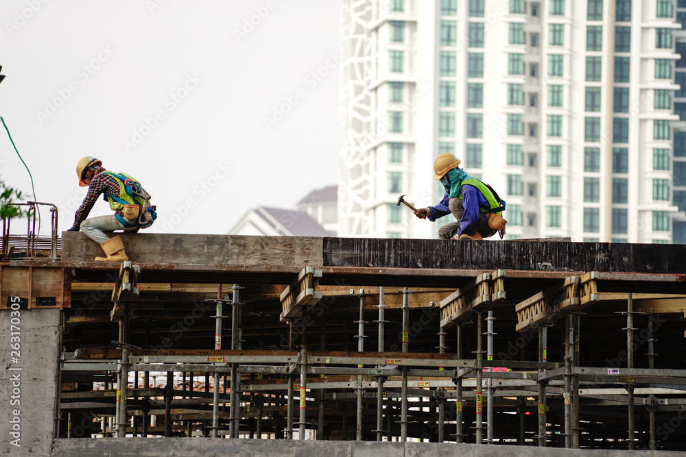 Fototapeta premium Construction worker with safety attire 