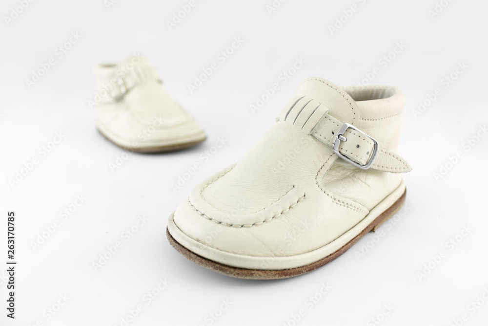 pair of baby shoes isolated on white background