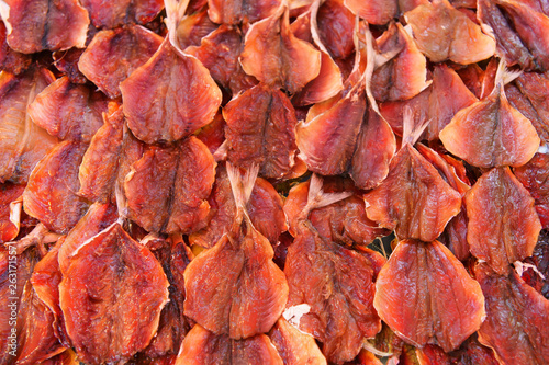 Stack of sun dried fish at fish market jetty. For seafood, food, kitchen, texture and background.