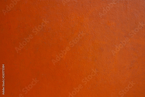Horizontal Orange color concrete wall background. Concrete wall textured for backdrop or background.