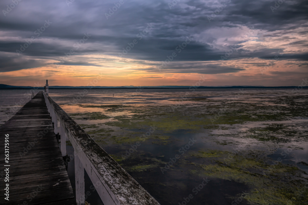 A large tidal lake at sunset.