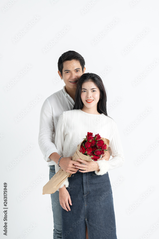 valentines day, love and people concept - happy couple with red heart shaped balloons, Roses, Big Red heart Paper over white background valentines day, love and people concept - happy couple with red heart shaped balloons, Roses, Big Red heart Paper over white background