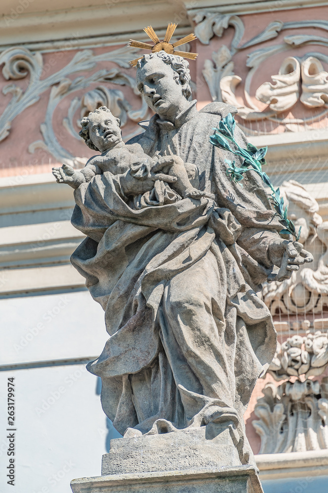 Decorative facade sculptures at Jesuit church of St. Ignatius of Loyola at Charles Square in Prague, Czech Republic