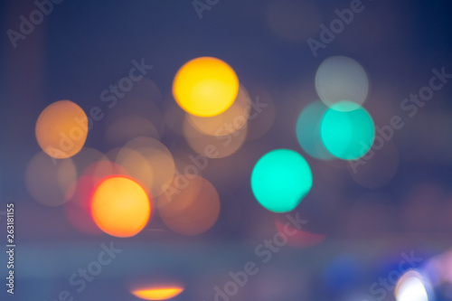 Colorful of light from car in the city at night.Blurred circle bokeh abstract background. © porntip