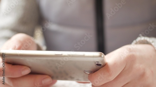 Business woman using a Smart phone Touchscreen CHROMA KEY- Close-up , Fingers make gestures touching typing text and swiping and scrolling the screen of a modern smartphone