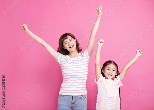 Happy mother and child celebrating success