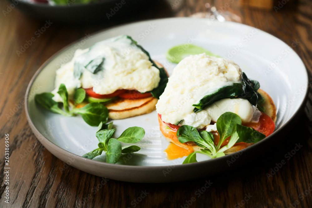 Pancakes with poached egg, cheese and spinach Pancakes with poached egg, cheese and spinach