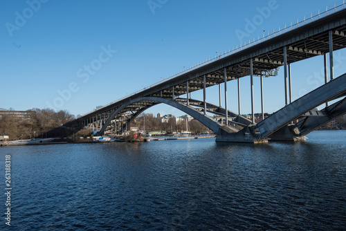 Water view over the Riddarfjärden bay and bridge in Stockholm a sunny spring day,