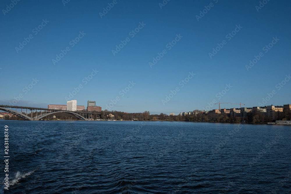 Water view over the Riddarfjärden bay in Stockholm a sunny spring day