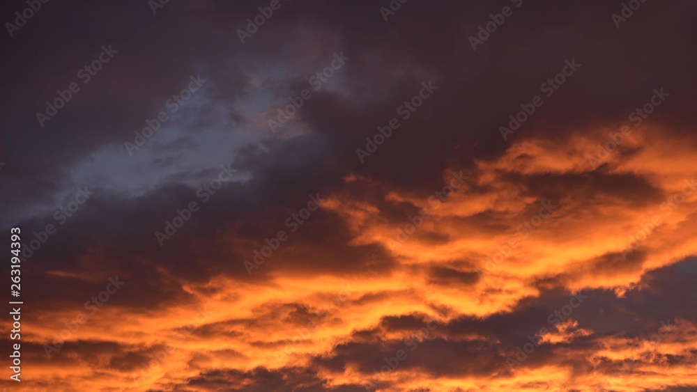 Red clouds covering blue sky, beautiful natural phenomenon