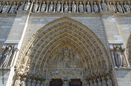 Fragment of facade of famous Notre Dame de Paris, Paris, France