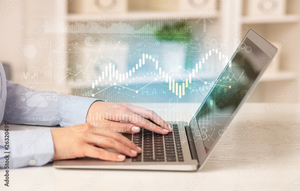 Business woman in homey environment using laptop with global financial report concept
Business woman in homey environment using laptop with global financial report concept