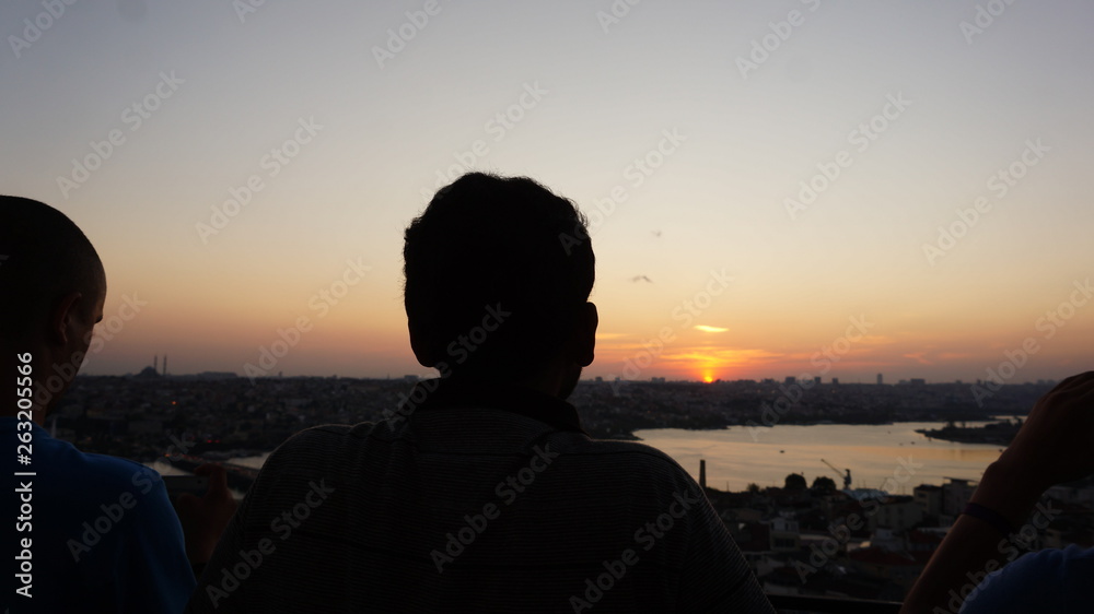 Fototapeta premium silhouette of man at sunset