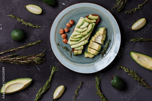 Healthy Breakfast with vegetables and fruits on a black background