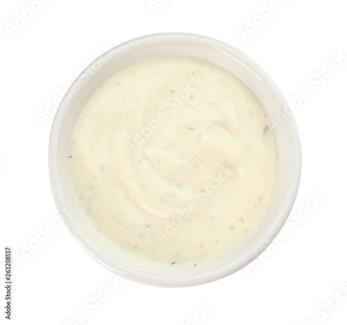Bowl of homemade garlic sauce isolated on white, top view