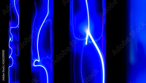 abstract neon background - electrical discharges in an inert gas flasks photo