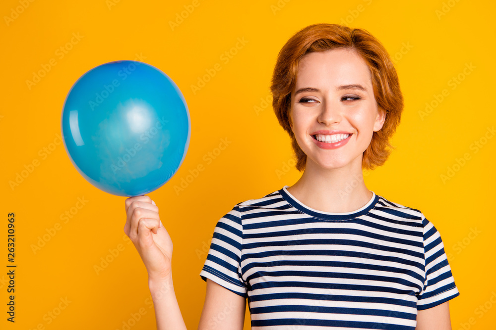 Close-up portrait of nice cute lovely charming attractive cheerful cheery glad positive feminine girl holding in hands blue baloon festal mood event isolated on bright vivid shine yellow background Close-up portrait of nice cute lovely charming attractive cheerful cheery glad positive feminine girl holding in hands blue baloon festal mood event isolated on bright vivid shine yellow background
