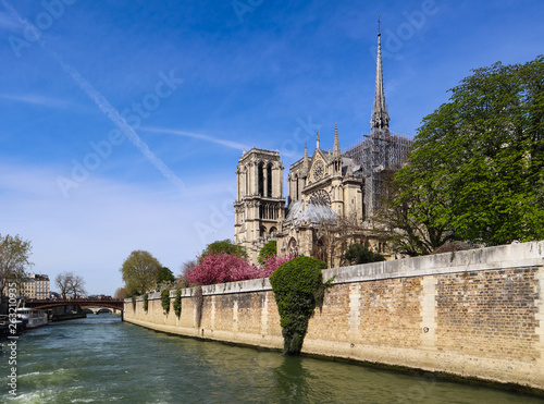 Notre Dame Cathedral over Seine river in spring. Before the fire. April 05, 2019. Paris France © OLAYOLA