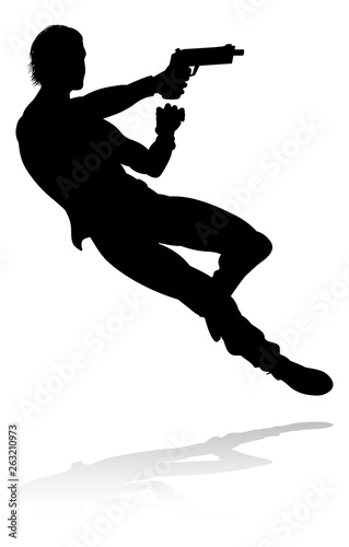 Silhouette person in an action movie film shoot out pose