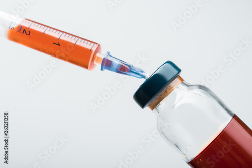 Injection syringe and ampoules medicine on a white background
