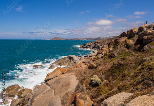 Fototapeta Naklejka Na Ścianę i Meble -  Waves crashing on rocks at Granite island, Victor Harbour, South Australia