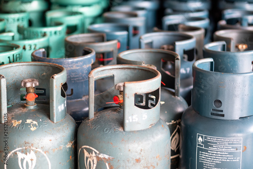 Stack of old  cooking gas cylinder in gas store.