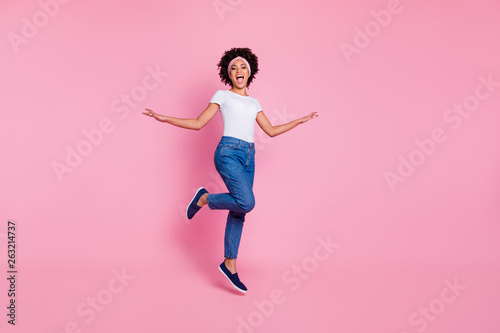 Full length body size view portrait of her she nice-looking adorable attractive winsome lovely fit thin slim cheerful carefree wavy-haired girl scarf strolling isolated over pink background