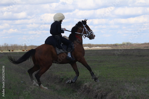 Race horses and riders on them.