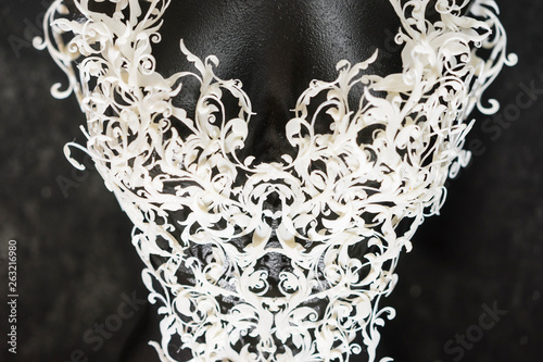 Piece made with 3d printer, is composed of white flowers that form a corset, handmade, fantasy design Baroque style photo