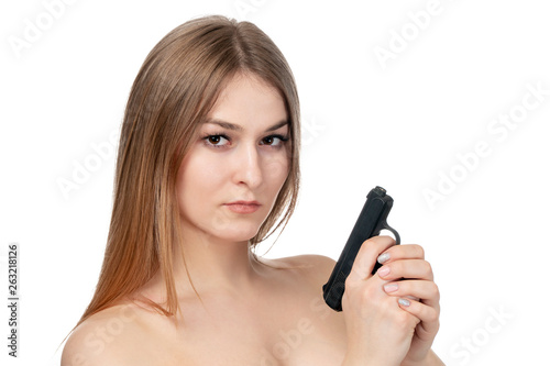 portrait of a sexy woman with gun