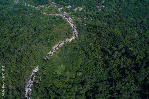 Aerial view waterfall in tropical deep forest green tree