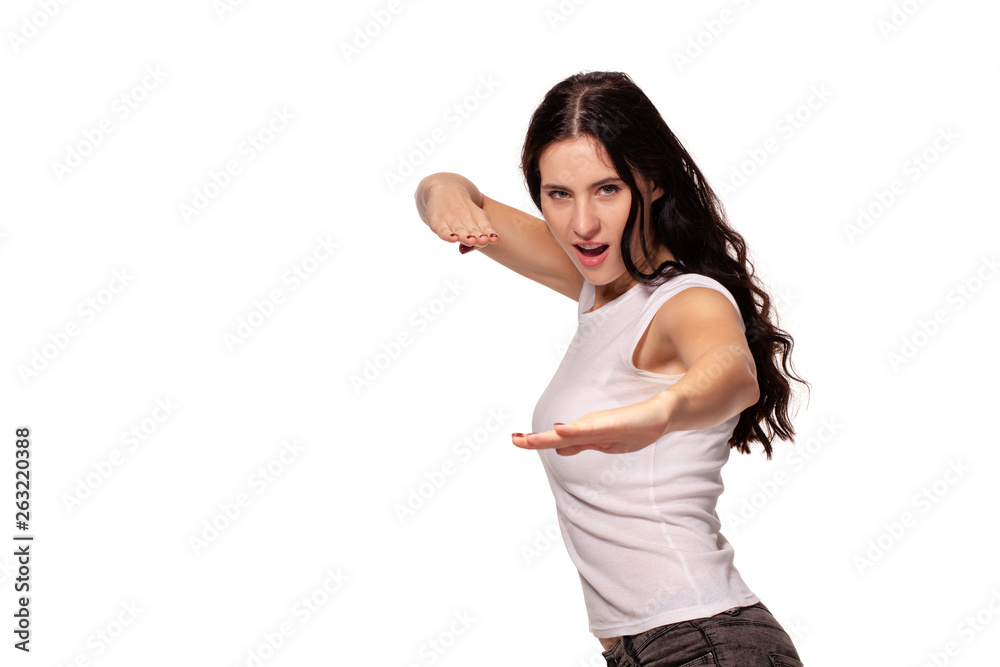 A beautiful woman shows martial art exercise A beautiful woman shows martial art exercise