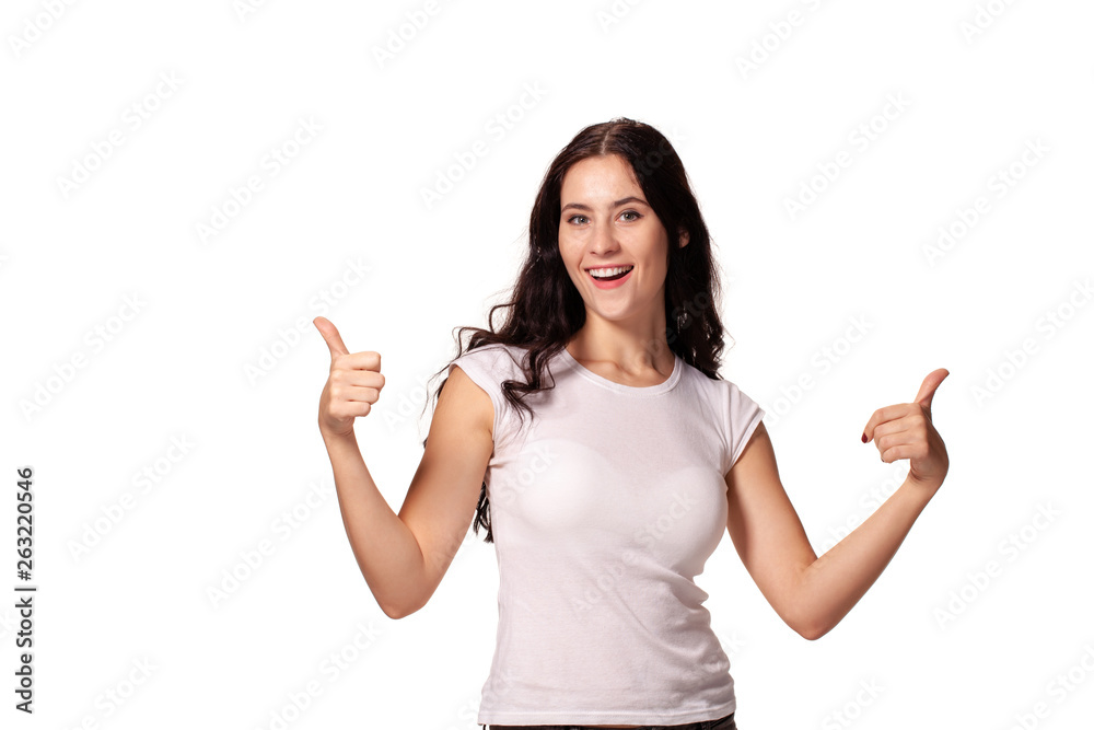Portrait of a young woman shows like this, thumbs up Portrait of a young woman shows like this, thumbs up