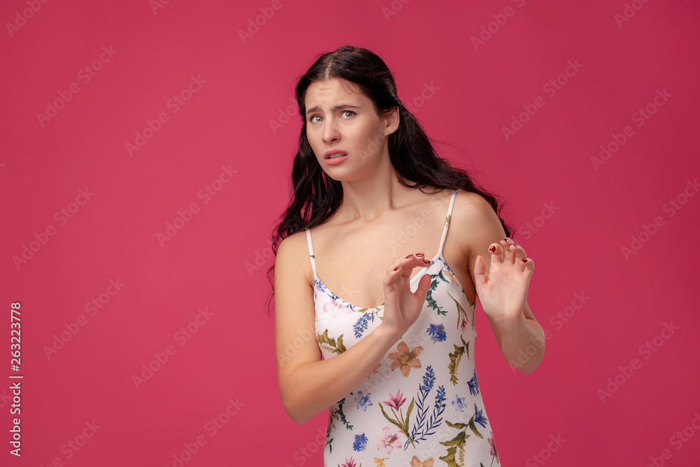 A young girl is trembling with fear, experiencing a real phobia for something, experiencing and afraid of the dark. A young girl is trembling with fear, experiencing a real phobia for something, experiencing and afraid of the dark.