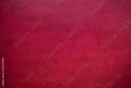 Abstract background of genuine red cartier leather photo