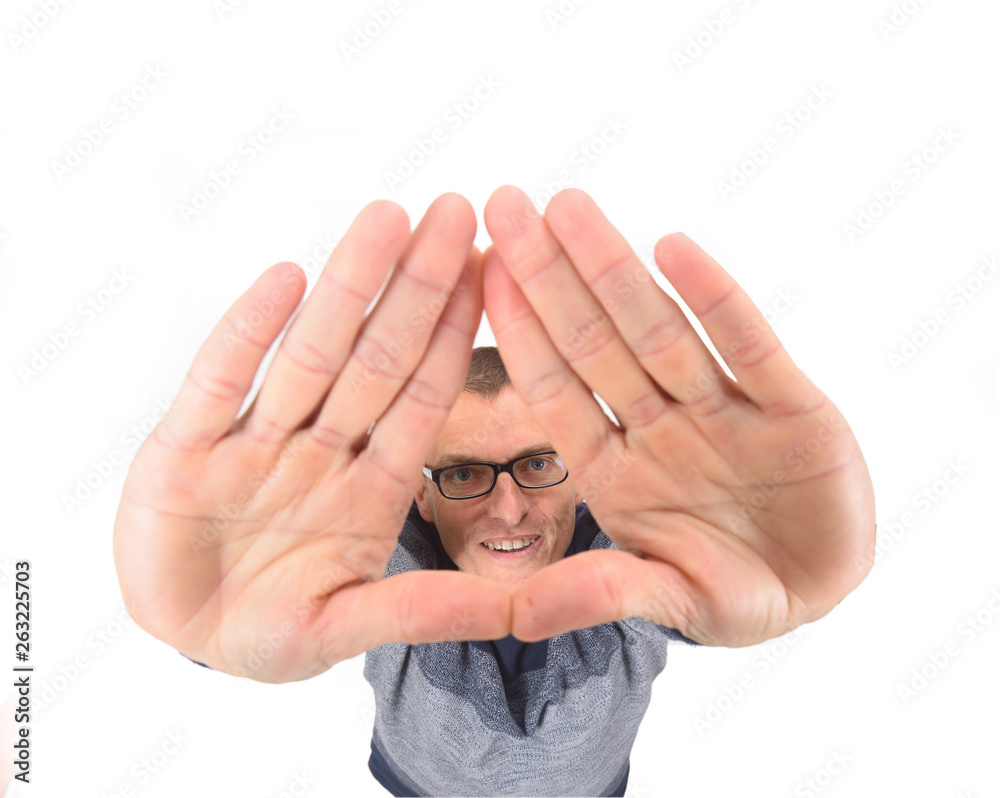 Fototapeta premium man two hands up on black background