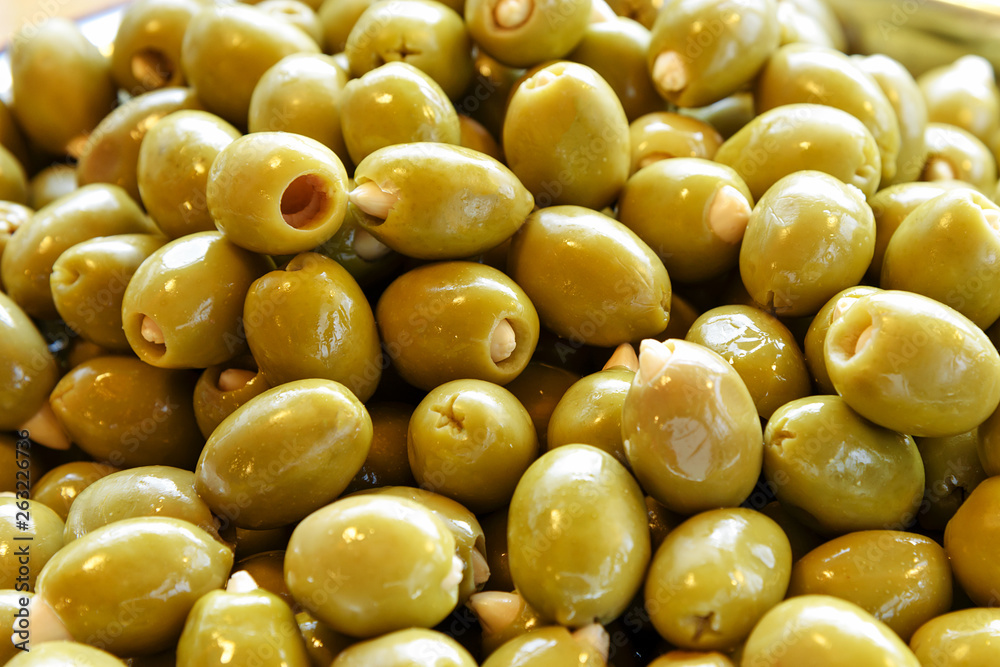 Closeup of fresh healthy green olives for sale at the farmers market. Closeup of fresh healthy green olives for sale at the farmers market.