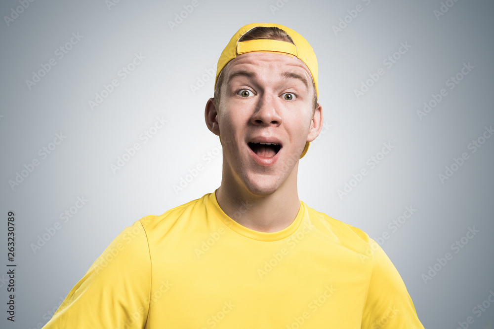 Happy teenager with mouth opened