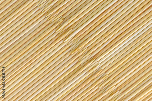Fototapeta Naklejka Na Ścianę i Meble -  even number of toothpicks, natural wood texture - for striped background, short focus, toning, haze