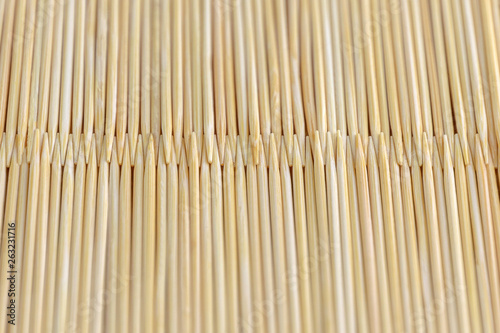 Fotografie even number of toothpicks, natural wood texture - for striped background, short