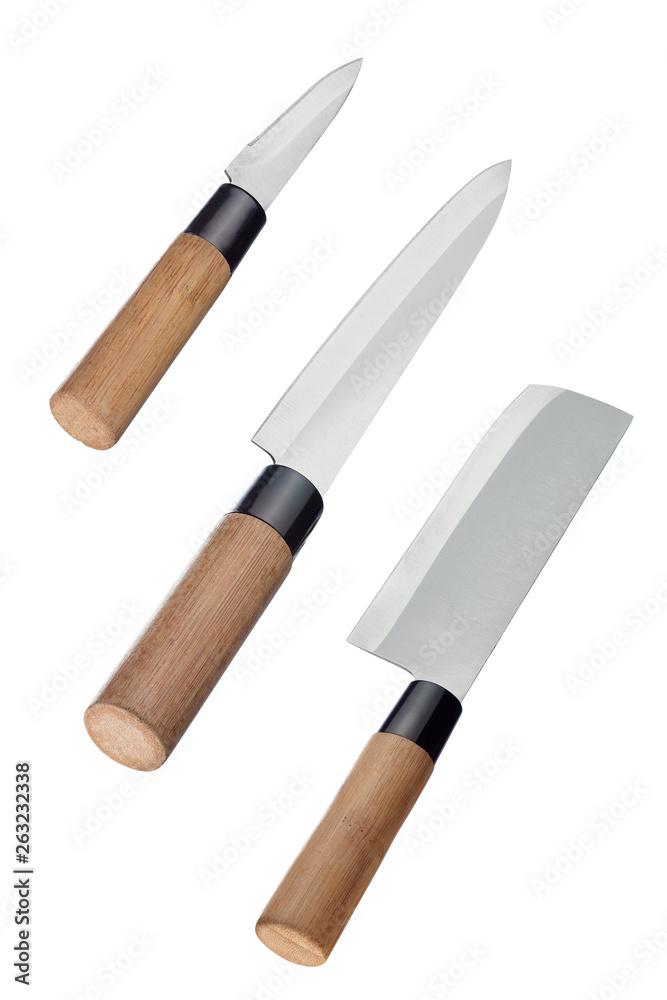 Set of Japanese steel kitchen knives with bamboo handles isolated on white background . Chef's knife. Vertical. Set of Japanese steel kitchen knives with bamboo handles isolated on white background . Chef's knife. Vertical.