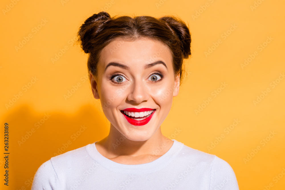 Close-up portrait of her she nice attractive lovely stunning glamorous funny cheerful cheery girl isolated over bright vivid shine yellow background Close-up portrait of her she nice attractive lovely stunning glamorous funny cheerful cheery girl isolated over bright vivid shine yellow background